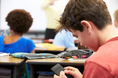 A student using smart technology in the classroom