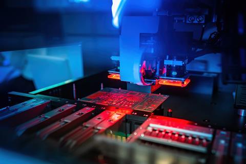 Close up of manufacturing printed circuit boards with a laser
