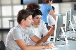 Students working together on the computer