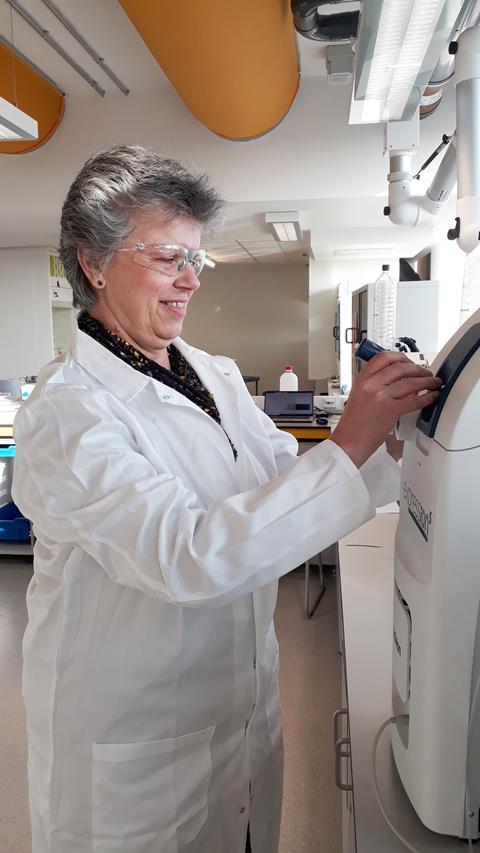 Gill working in a lab