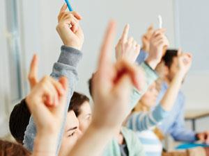 Students raising their hands