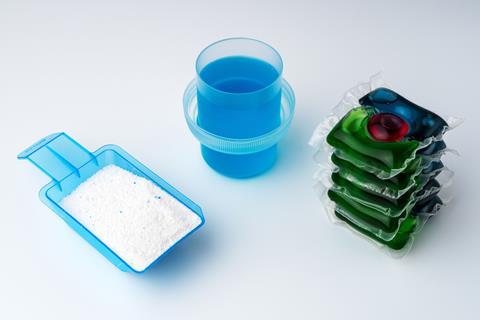 A photo of three types of laundry detergent - powder, liquid and a liquid tablet