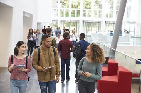 Three students attending a university open day