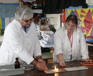 A teacher trying one of the experiments