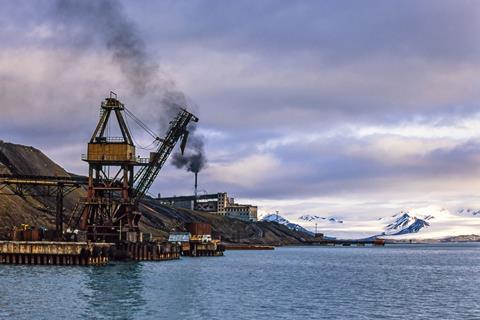 A coal mining facility next to the sea