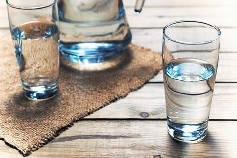 Drinking water in a glass