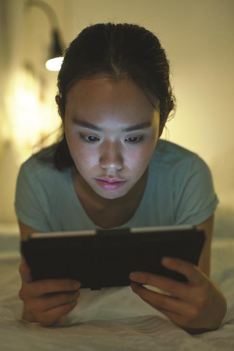 A school student using a tablet