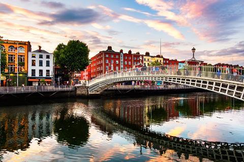 Ha Penny Bridge in Dublin, Ireland at sunset