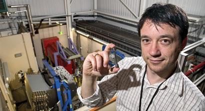 Figure 5 - Michael Preuss holding a test sample at the ENGIN-X instrument