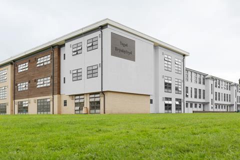 The outside of a large modern school