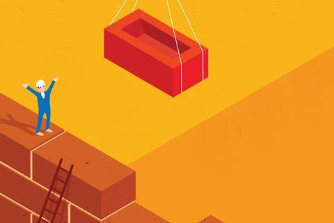 A tiny builder guides an oversized brick on a crane into a space on a wall