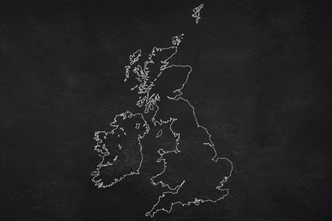 A map of the UK and Ireland in chalk on a blackboard