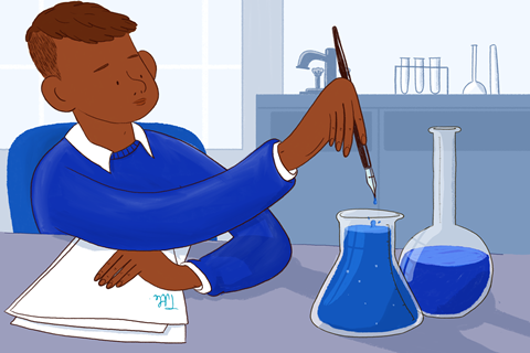 An image showing a male student dipping his pen into a conical flask containing ink