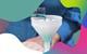 Funnel with filter paper over a conical flask, blue solution poured into top