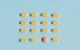 A photograph of yellow-orange pills arranged in rows on a blue background; in the bottom row, a different, red pill stands out