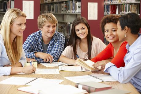 A group of students working together in a school library