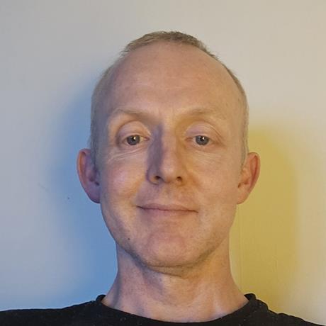 A headshot of Colin McGill